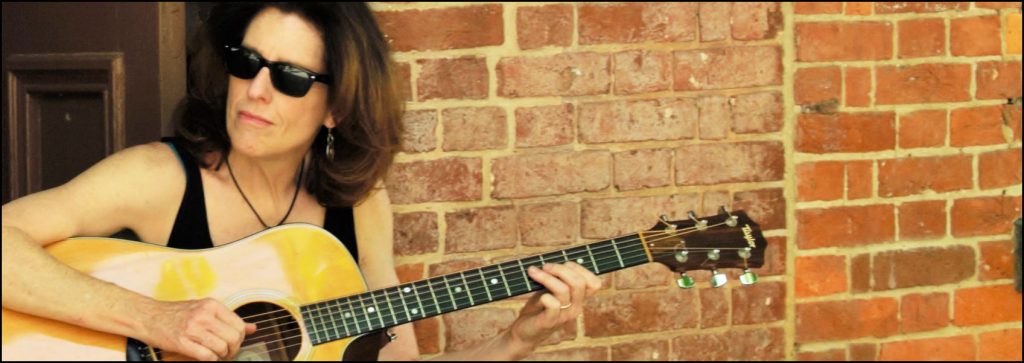 Julia with her guitar